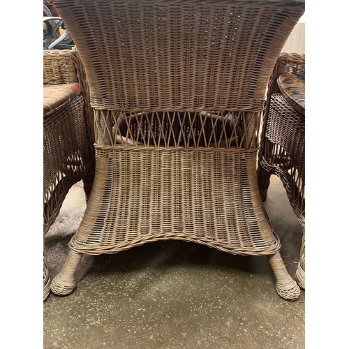 84 - BLEACHED RATTAN CIRCULAR/PATIO TABLE AND FOUR HIGH BACK CHAIRS