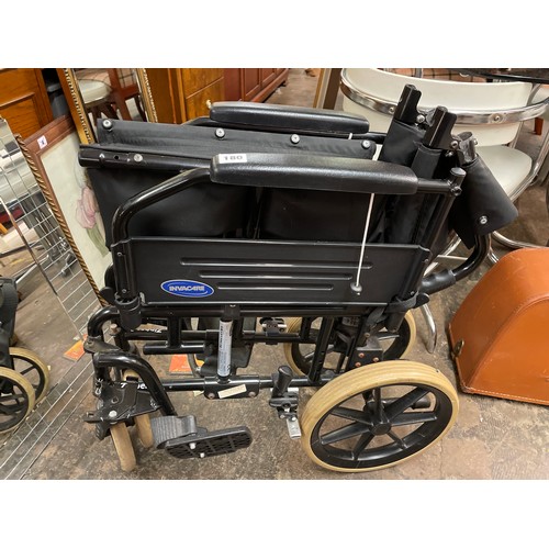 180 - INVACARE FOLDING WHEEL CHAIR