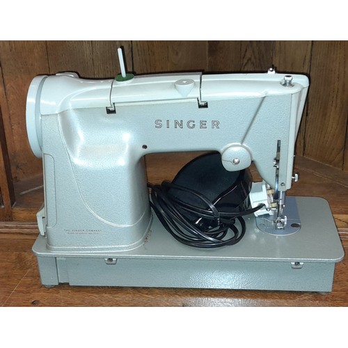 90 - CASED SEWING MACHINE