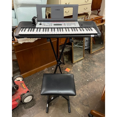 134 - YAMAHA PORTABLE 260 KEY BOARD, FOLDING STAND & STOOL