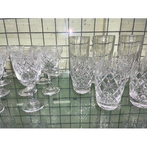 204 - TWO SHELF OF VARIOUS SETS OF CUT GLASS TUMBLERS, WINES, AND SHERRY GLASSES