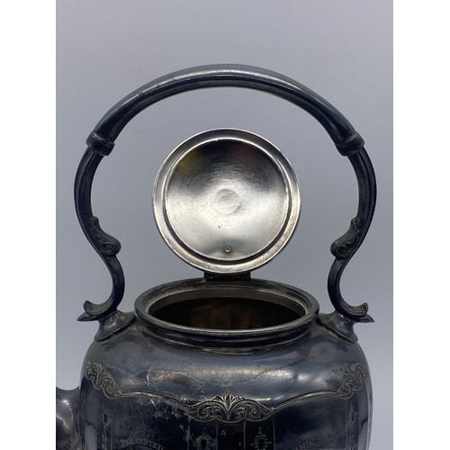 218 - 1927 WIMBLEDON PLATED SPIRIT KETTLE ON STAND