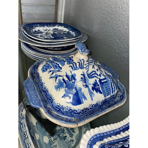 200 - MAINLY 19TH CENTURY BLUE AND WHITE TRANSFER PRINTED TUREENS AND COVERS, PLATES, AND OVAL DISHES