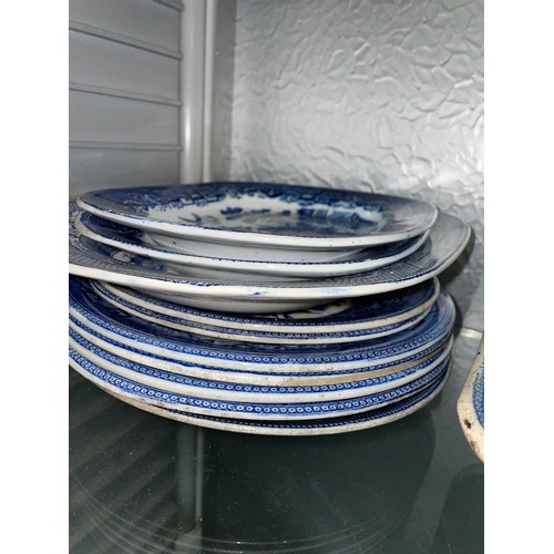 200 - MAINLY 19TH CENTURY BLUE AND WHITE TRANSFER PRINTED TUREENS AND COVERS, PLATES, AND OVAL DISHES