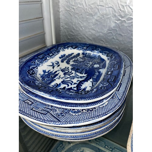 200 - MAINLY 19TH CENTURY BLUE AND WHITE TRANSFER PRINTED TUREENS AND COVERS, PLATES, AND OVAL DISHES