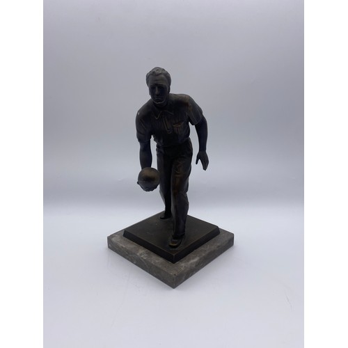 488 - PATINATED SPELTER FIGURE OF THE CROWN GREEN BOWLER