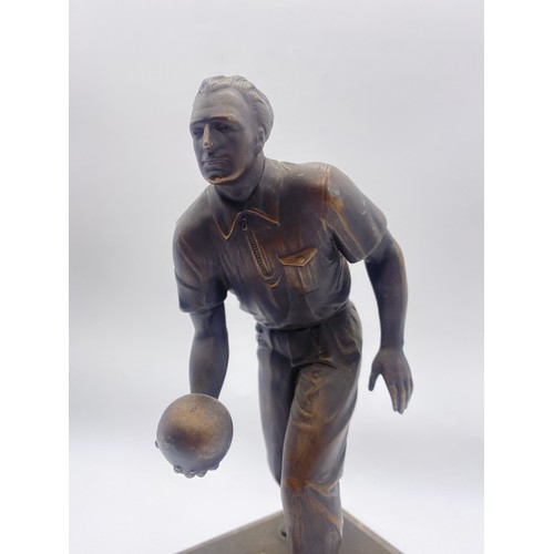 488 - PATINATED SPELTER FIGURE OF THE CROWN GREEN BOWLER