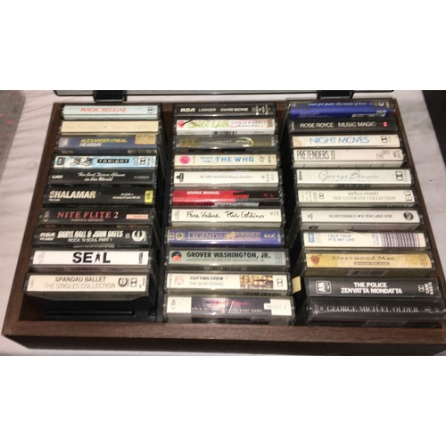 298 - PERSPEX BOX OF TAPE CASSETTE MUSIC