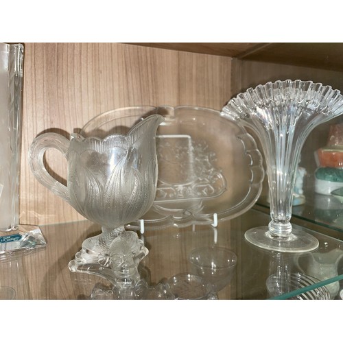 284 - TWO SHELVES OF ANTIQUE AND LATER CUT AND PRESSED GLASSWARE INCLUDING PEDESTAL SALT, SPILL VASES, GOB... 