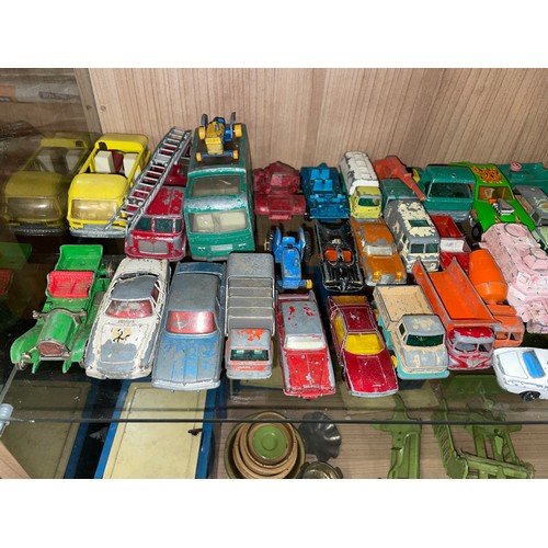 289 - TWO SHELVES OF PLAYWORN DIE CAST MODEL CARS, TRUCKS, AND TRANSPORTERS