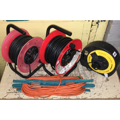 398 - THREE EXTENSION PLUG SOCKET REELS AND GARDEN REEL