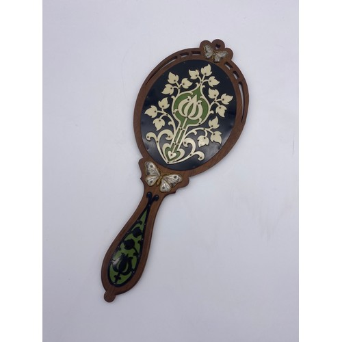 461 - ART NOUVEAU WOODEN AND BUTTERFLY APPLIED DECORATIVE BACKED HAND MIRROR