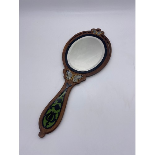 461 - ART NOUVEAU WOODEN AND BUTTERFLY APPLIED DECORATIVE BACKED HAND MIRROR