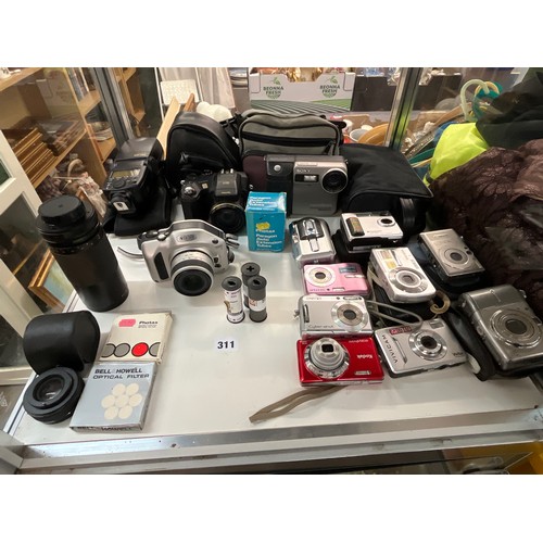 311 - NIKON AND FUJI 9 PIX CAMERA, SONY AND SAMSUNG CYBER SHOT CAMERAS AND RELATED ITEMS