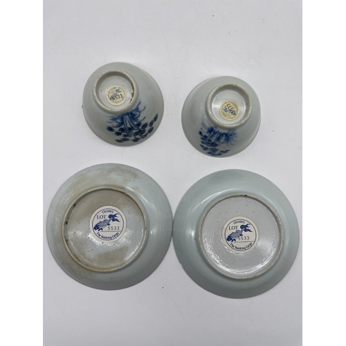 588 - PAIR OF CH-ING DYNASTY BLUE AND WHITE CHINESE EXPORT NANKING CARGO PINE TREE TEA BOWLS AND SAUCERS W... 