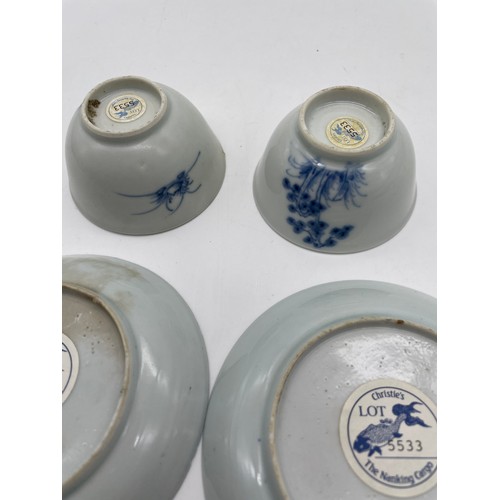 588 - PAIR OF CH-ING DYNASTY BLUE AND WHITE CHINESE EXPORT NANKING CARGO PINE TREE TEA BOWLS AND SAUCERS W... 