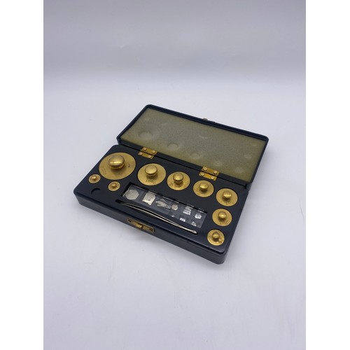 441 - CASED SET OF BRASS WEIGHTS WITH TWEEZERS