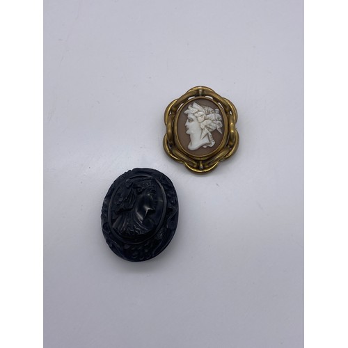 572 - VICTORIAN GILT METAL CARVED SWIVEL CAMEO BROOCH AND A JET CAMEO BROOCH