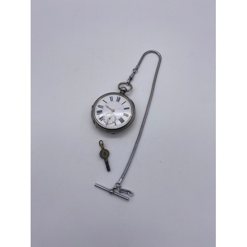 569 - BIRMINGHAM SILVER CASED POCKET WATCH WITH A PLATED ALBERT CHAIN AND WATCH KEY