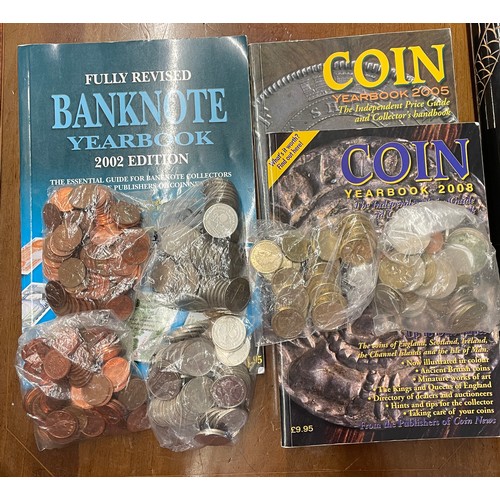 562 - BAG OF ASSORTED WORLD COINS AND COIN YEAR BOOKS