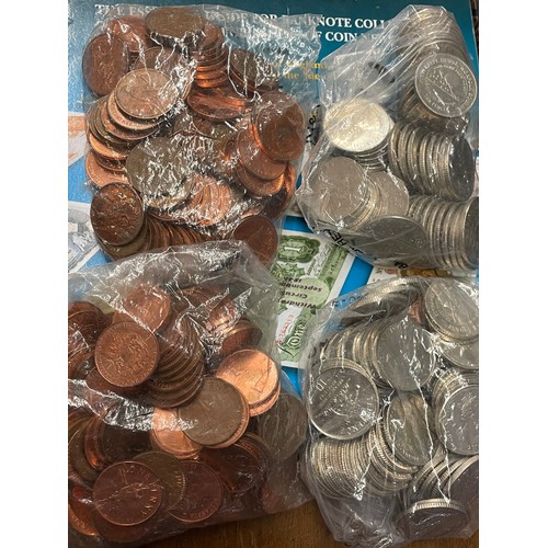 562 - BAG OF ASSORTED WORLD COINS AND COIN YEAR BOOKS