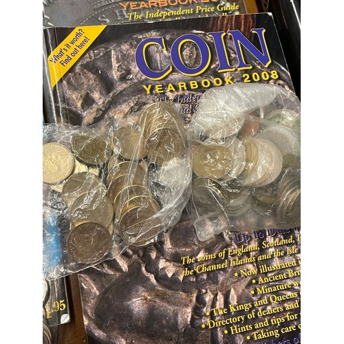 562 - BAG OF ASSORTED WORLD COINS AND COIN YEAR BOOKS