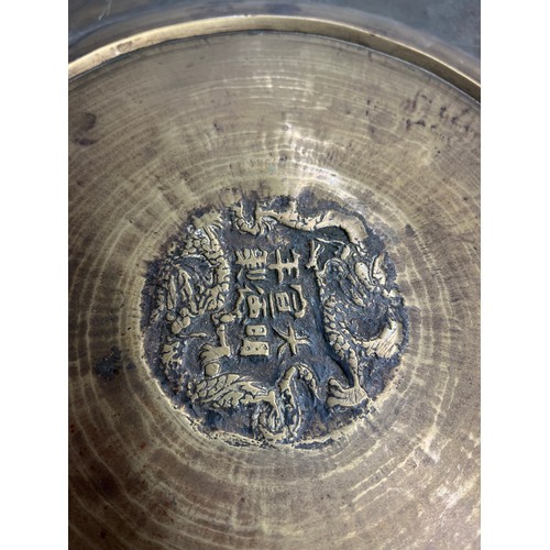 583 - CHINESE BRONZE CIRCULAR CHARGER ENGRAVED WITH DRAGONS WITH SEAL MARK TO VERSO