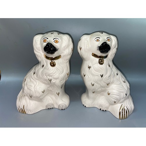 520 - PAIR OF ROYAL DOULTON 137-5 SEATED SPANIEL FIGURES