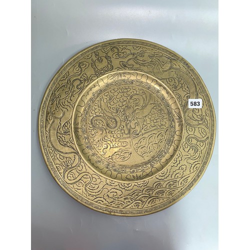 583 - CHINESE BRONZE CIRCULAR CHARGER ENGRAVED WITH DRAGONS WITH SEAL MARK TO VERSO