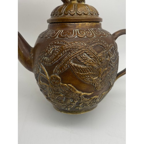 585 - CHINESE METALWARE MINIATURE TEAPOT WITH PHEONIX AND DRAGON DECORATION