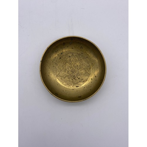 584 - ORIENTAL ENGRAVED CYLINDRICAL BOX, SHALLOW BRASS DISHES AND SMALL BHUDDAVISTA