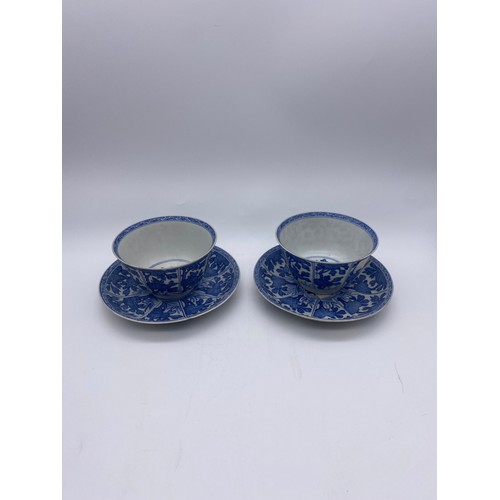 591 - PAIR OF BLUE AND WHITE CHINESE EXPORT VUNG TAU CARGO FLORAL PANELLED BOWLS AND SAUCERS