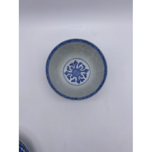 591 - PAIR OF BLUE AND WHITE CHINESE EXPORT VUNG TAU CARGO FLORAL PANELLED BOWLS AND SAUCERS