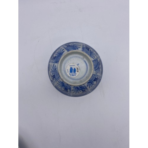 591 - PAIR OF BLUE AND WHITE CHINESE EXPORT VUNG TAU CARGO FLORAL PANELLED BOWLS AND SAUCERS