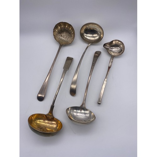 447 - FIVE 19TH CENTURY PLATED LADLES