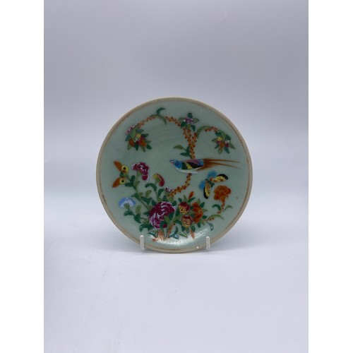 503 - CHINESE EXPORT FAMILLE ROSE PLATES PAINTED WITH BUTTERFLIES AND A SMALLER SAUCER DISH