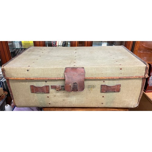 96 - CANVAS AND LEATHER STRAPPED LUGGAGE TRUNK