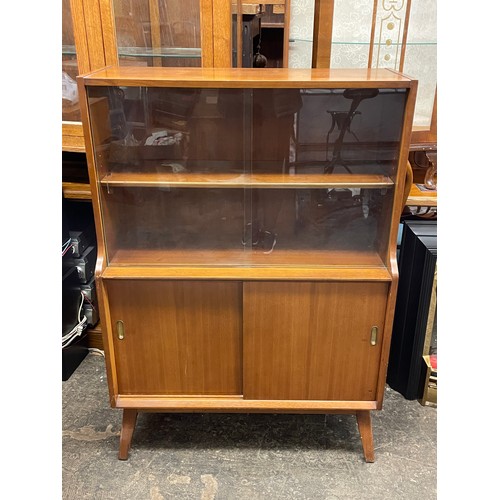 74 - 1950S GLAZED SLIDING DOOR CABINET