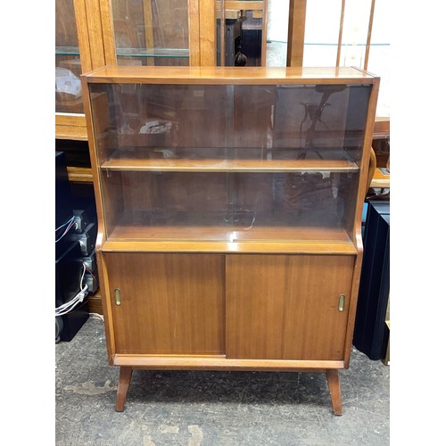 74 - 1950S GLAZED SLIDING DOOR CABINET