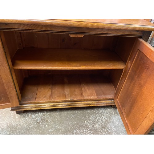 37 - ELM FIELDED PANEL TWO DOOR CUPBOARD