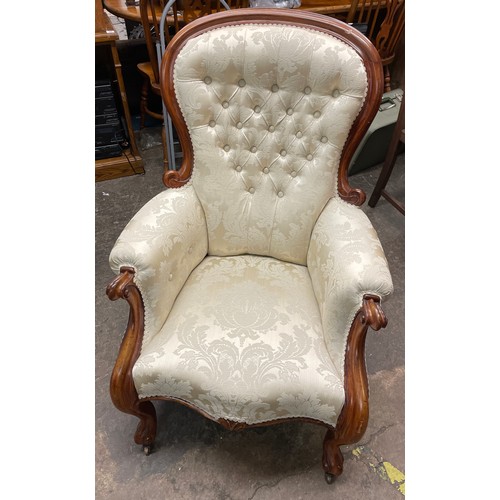 172 - VICTORIAN WALNUT CREAM BROCADE BUTTON BACK GENTLEMANS ARMCHAIR