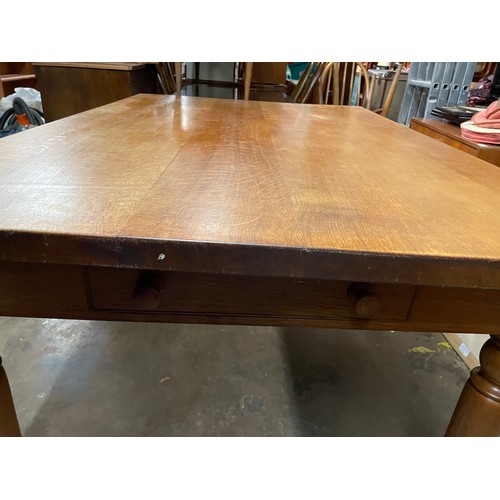 175 - OAK FARMHOUSE TYPE DINING TABLE FITTED WITH ONE SHALLOW DRAWER