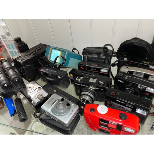 349 - SHELF OF VARIOUS CAMERAS, BINOCULARS, LIGHT METERS AND FLASH