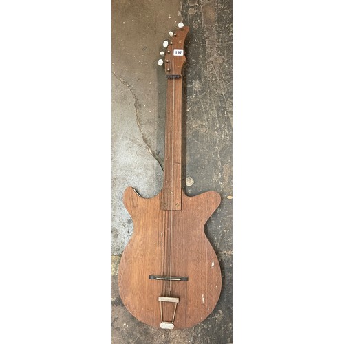 197 - WOODEN CUT OUT IMITATION GUITAR