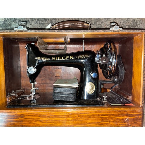 130 - CASED SINGER SEWING MACHINE