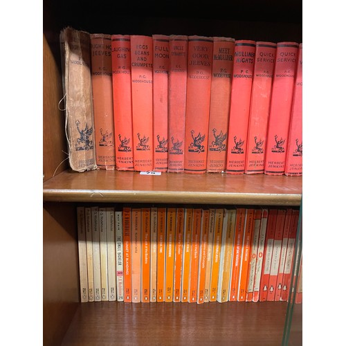 75 - SELECTION OF PG WODEHOUSE HARD BACK BOOKS BY HERBERT JENKINS, AND PENGUIN ORANGE PAPERBACK BOOKS