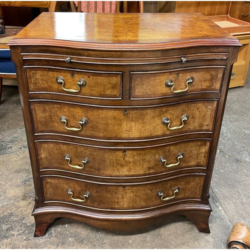 167 - REPRODUCTION GEORGE III STYLE BURR WALNUR CROSS BANDED SERPENTINE CHEST WITH A SLIDE ABOVE TWO SHORT... 