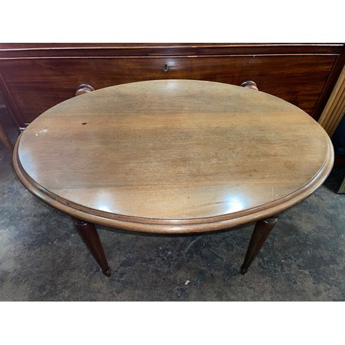 135 - OVAL MOULDED TOPPED OCCASIONAL TABLE ON TAPERED LEGS