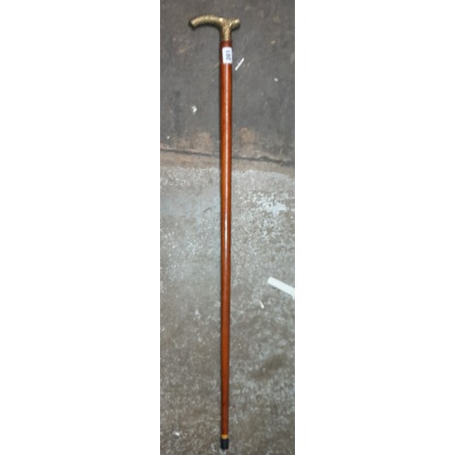 201 - TWO SHOOTING STICKS AND BRASS HEADED WALKING CANE