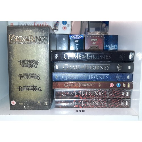 372 - DVD BOX SETS, INDIANA JONES, HARRY POTTER, MODERN FAMILY, LORD OF THE RINGS